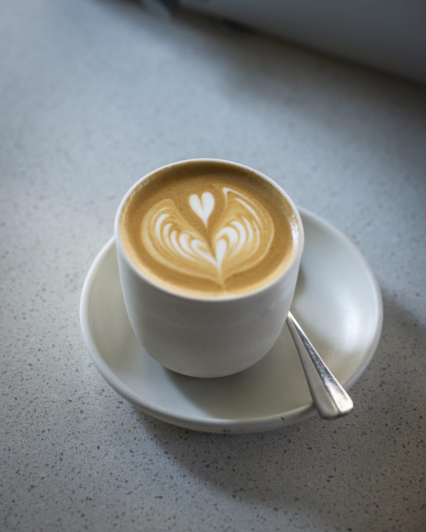 A Sample Coffee latte served at Flour and Stone.